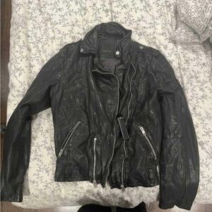 Leather Jacket. Bought brand new a few years ago for my bike test.